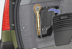 The towing eye is installed in the lefthand side trim of the boot.
