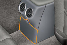 Storage area, built into the rear of the front armrest, for the rear passengers.