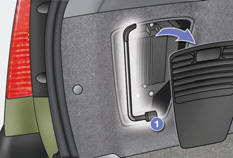 The wheelbrace 1 is stowed in the boot left-hand side trim; for access to it: