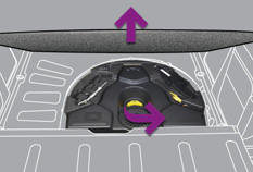 To make the operation easier, remove the adjustable boot floor, unscrew the yellow