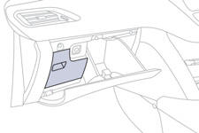 The extraction tweezer is fitted to the back of the fusebox cover located inside